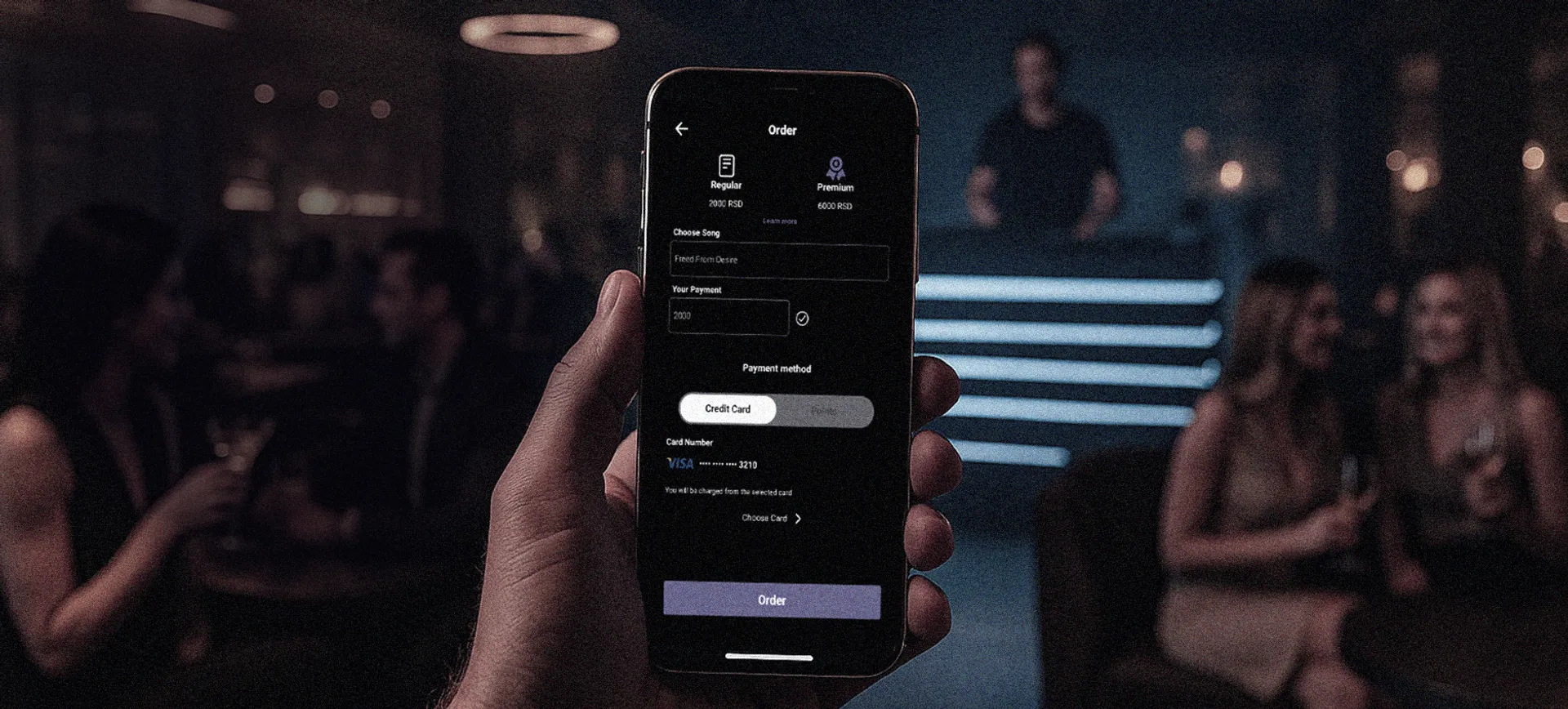 Request a song at the club via the Jukebox app - user picking a song from their phone.